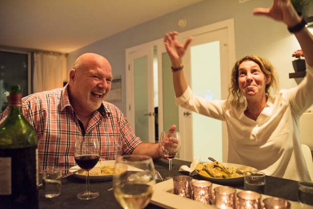 istock Mature LGBTQ friends having fun at dinner. 1208462722