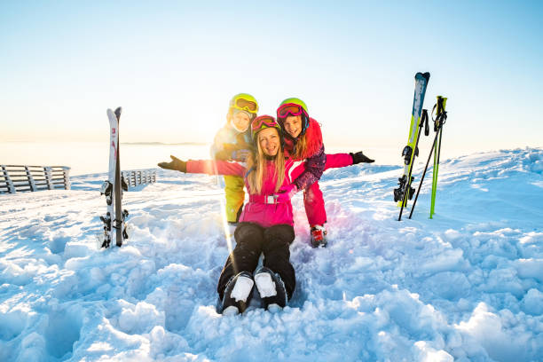 istock Mother with kids on skiing 1208462849