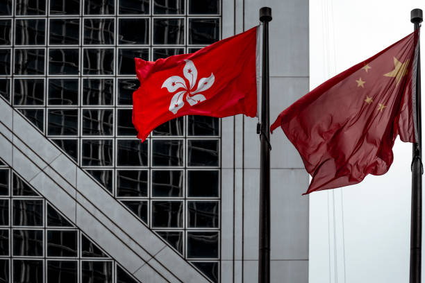 istock Chinese and Hong Kong flags 1208467713