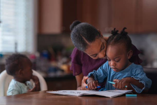 istock A young mother playing with her children 1208469158