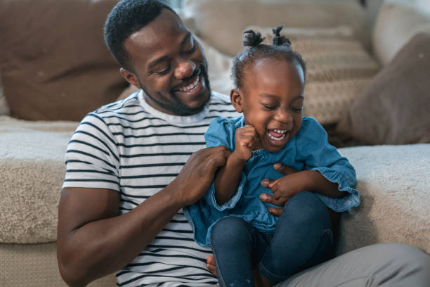 istock A father and daughter play together 1208469175