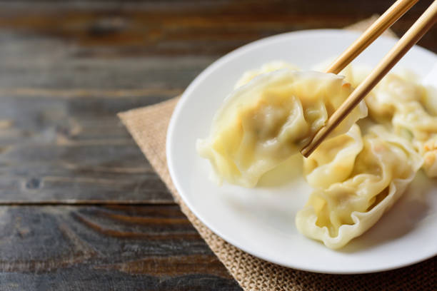 istock Steamed wonton dumpling stuffed with minced pork and shrimp 1208476237