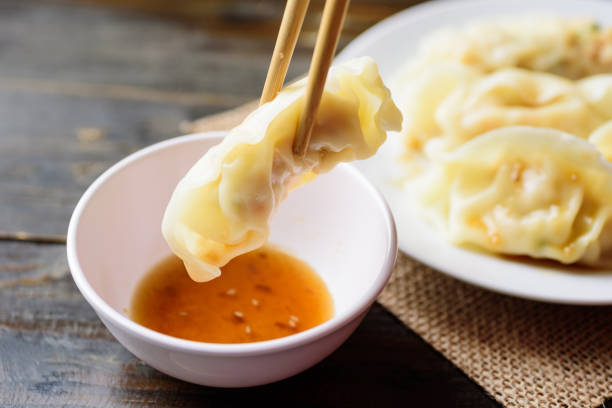 istock Steamed wonton dumpling stuffed with minced pork and shrimp 1208476316