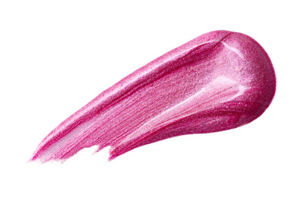 istock Lip gloss sample isolated on white. Smudged pink lipgloss. 1208477310