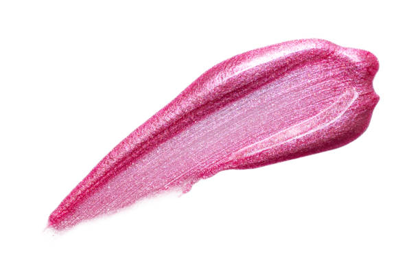 istock Lip gloss sample isolated on white. Smudged pink lipgloss. 1208477348