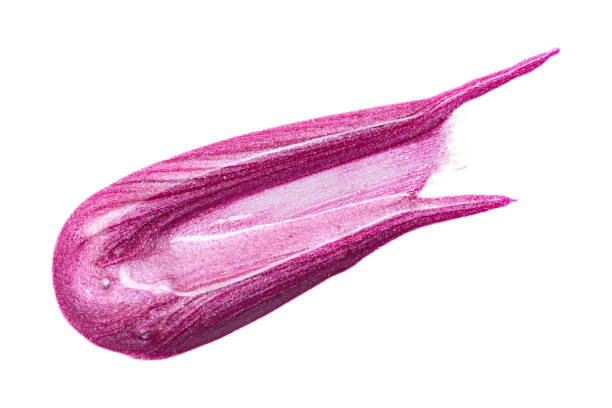 istock Lip gloss sample isolated on white. Smudged pink lipgloss. 1208477395
