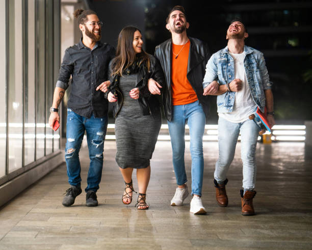 istock Group of friends having fun at night 1208485454