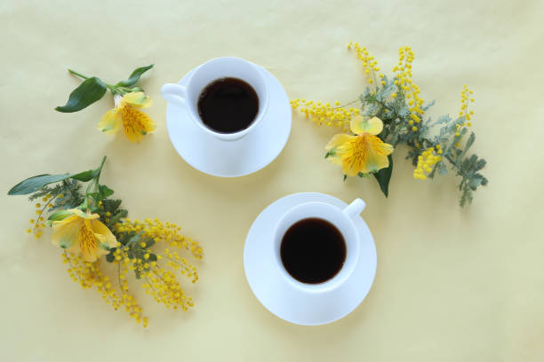 istock Mimosa and alstroemeria and coffee 1208486561