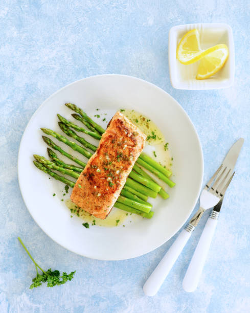 Grilled salmon on asparagus