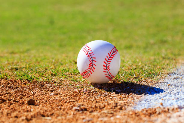 istock Baseball on Infield or Outfield with Grass and Dirt 1208497425