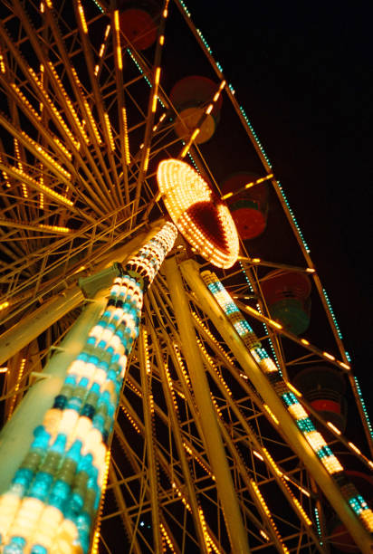 istock Ferris wheel at night festival 1208500846