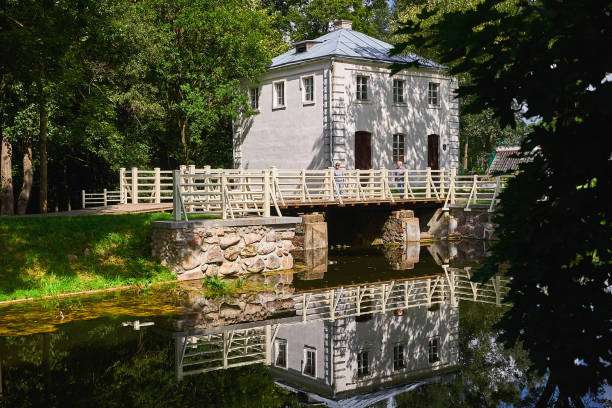 istock Old stone water mill. Water mill building. 1208502554