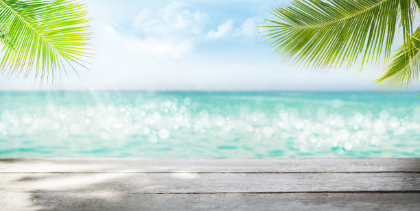 istock Summer tropical sea and empty wooden table 1208503515