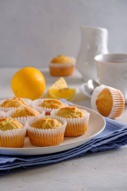 istock Delicate and delicious lemon cupcakes with crisp on a white plate 1208506666
