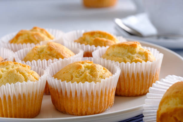 istock Delicate and delicious lemon cupcakes with crisp on a white plate 1208506694