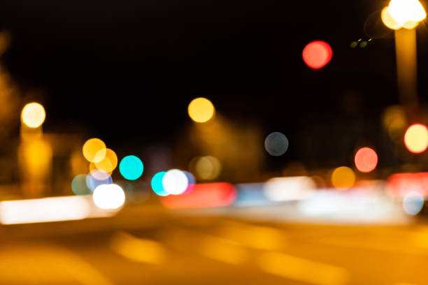 istock Blurred city lights of an intersection at night 1208508513