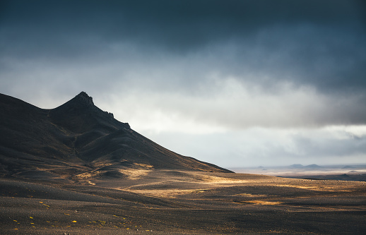 Dramatic volcanic landscape in Iceland illuminated by the sunlight.