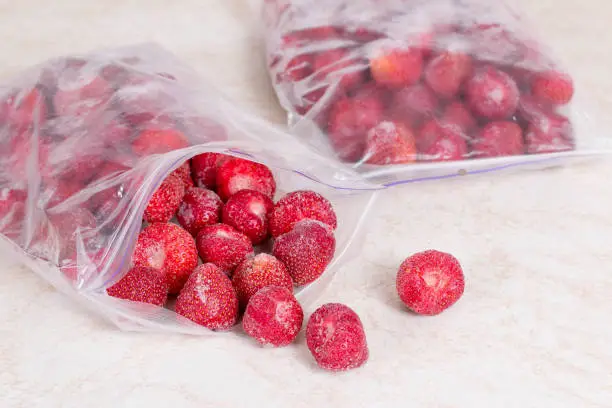 Photo of Frozen strawberries in bags