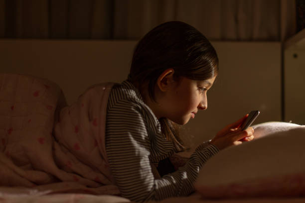 istock little girl doing her homework 1208518999