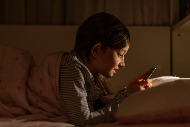 istock little girl doing her homework 1208519002