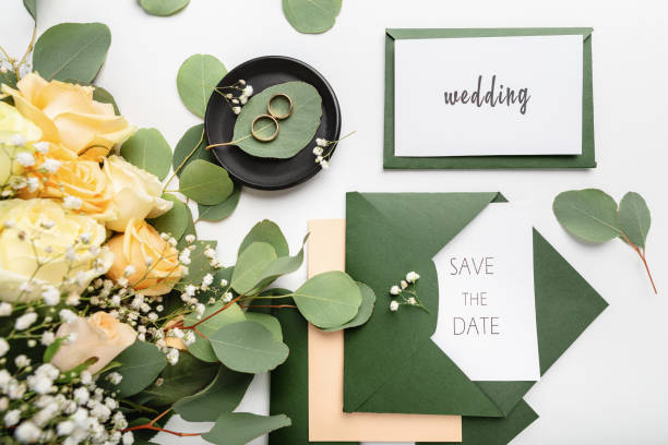 istock Wedding invitations save the date in green envelopes 1208525125