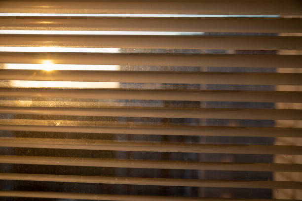 istock jalousie at windows close up 1208525356