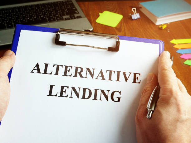 istock Male is reading Alternative Lending agreement. 1208526758