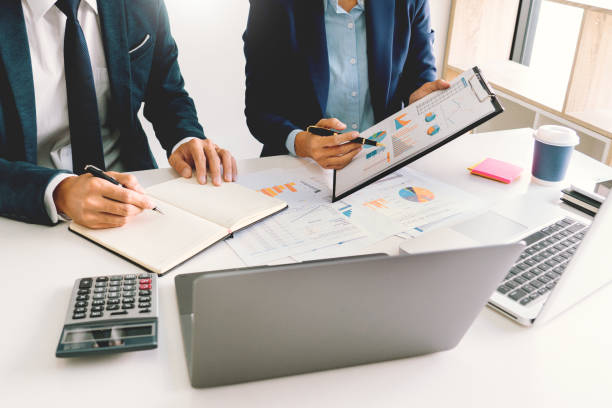 istock Midsection Of Business Person Brainstorming Over Document In Office 1208527551
