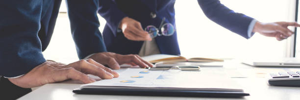 istock Midsection Of Business Person Brainstorming Over Document In Office 1208529384