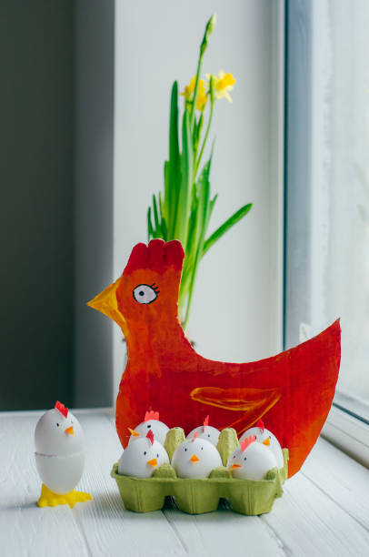 istock Easter decoration painted paper hen and chickens from eggs 1208532103