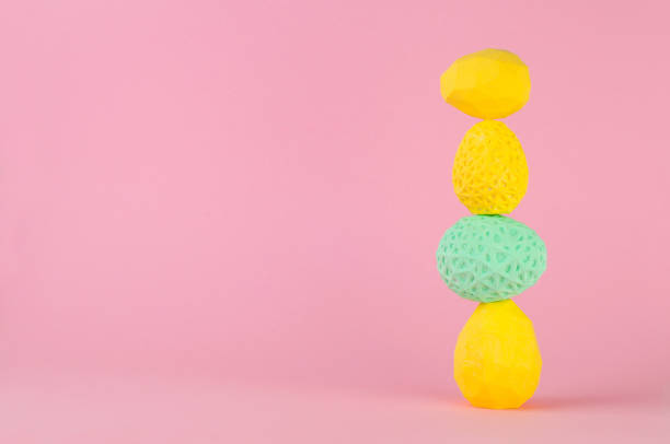 istock Color geometric Easter eggs on turquoise and pink background 1208543134
