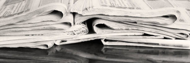 istock Background from old newspapers, media concept 1208544391