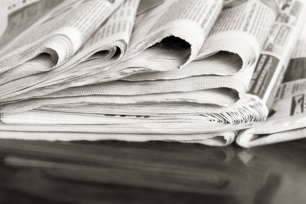istock Background from old newspapers, media concept 1208544441