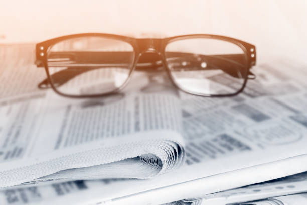 istock Background from old newspapers, media concept 1208544442