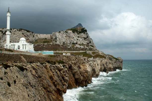 istock View along rugged coastline with mosque against a stormy sky 1208547068