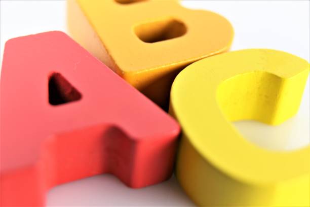 istock alphabet blocks with letters on white background 1208548814