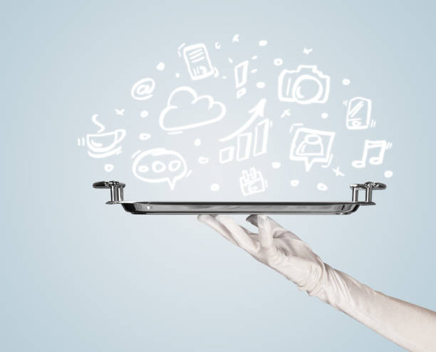 istock Waiter holding tray with media icons 1208549214