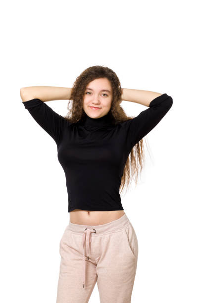 cute teenager girl with long curly hair, on a white background - human hair flowing fashion beauty spa imagens e fotografias de stock