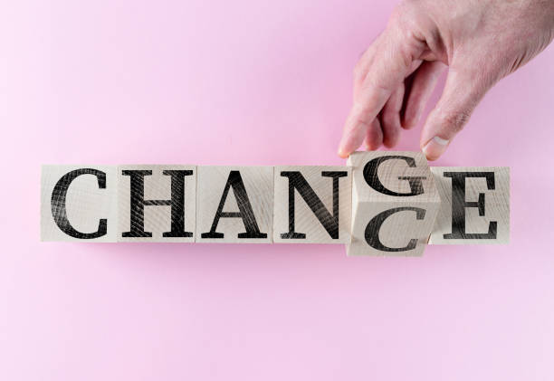 istock hand turning word CHANGE into CHANCE on wooden blocks 1208553361