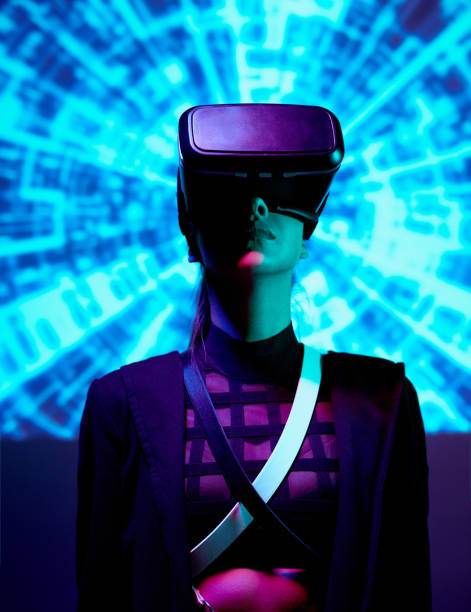 istock Serious curious woman in crossed belts on chest looking through virtual reality goggles against cyclical background 1208554549