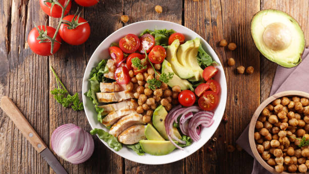 istock mixed vegetable salad with avocado, chicken, chickpea, onion and tomato 1208558403