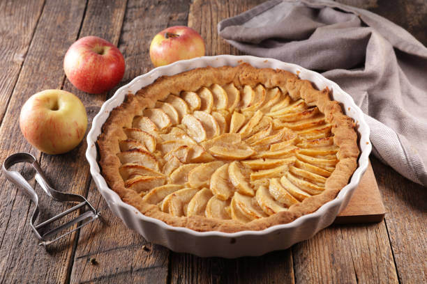 istock delicious apple pie on wooden board 1208558417