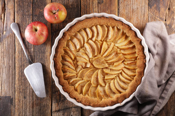 istock delicious apple pie on wooden board 1208558423