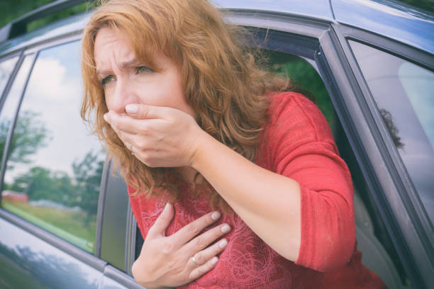 istock Woman suffering from motion sickness 1208560817