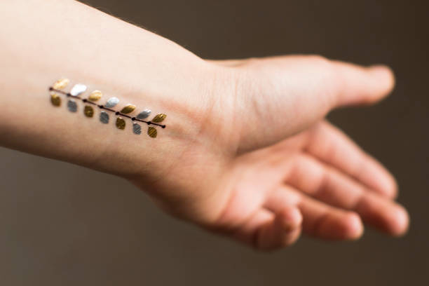 istock young woman's hand with temporary tattoo 1208561271