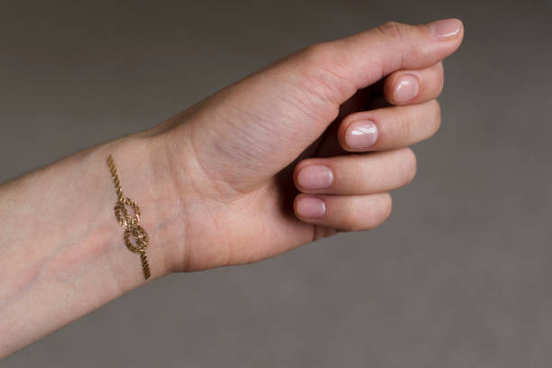 istock young woman's hand with temporary tattoo 1208561328