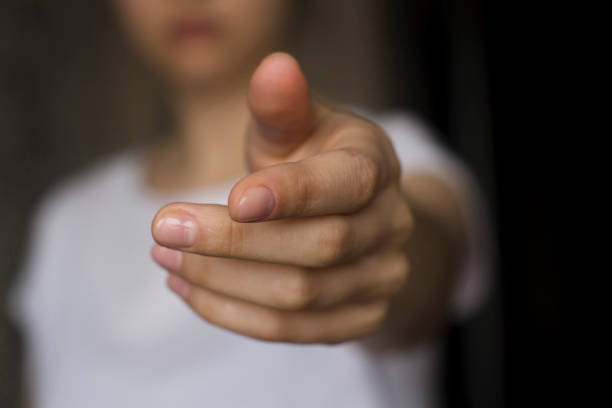 istock young woman's hand reaching out 1208561365
