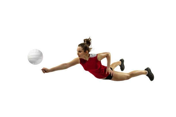 istock Young female volleyball player isolated on white studio background in flight and motion 1208562166