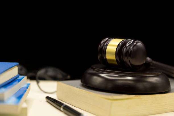 istock Judges gavel on book and wooden table. 1208562198