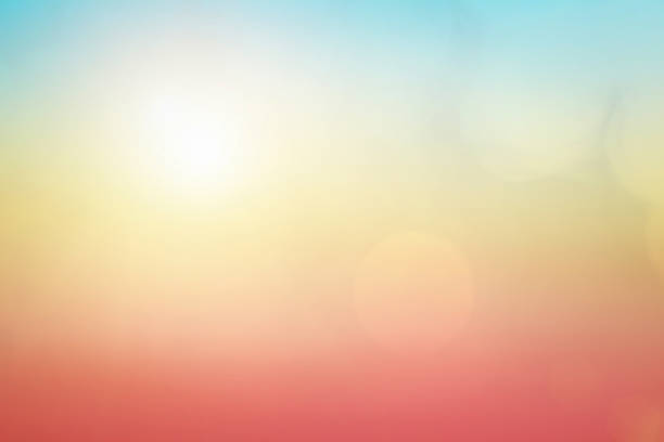 istock Natural background blurring warm colors and bright sun light. Bokeh or Christmas background Green Energy at sky sunny color orange light patterns plain abstract flare evening clouds blur. 1208562651
